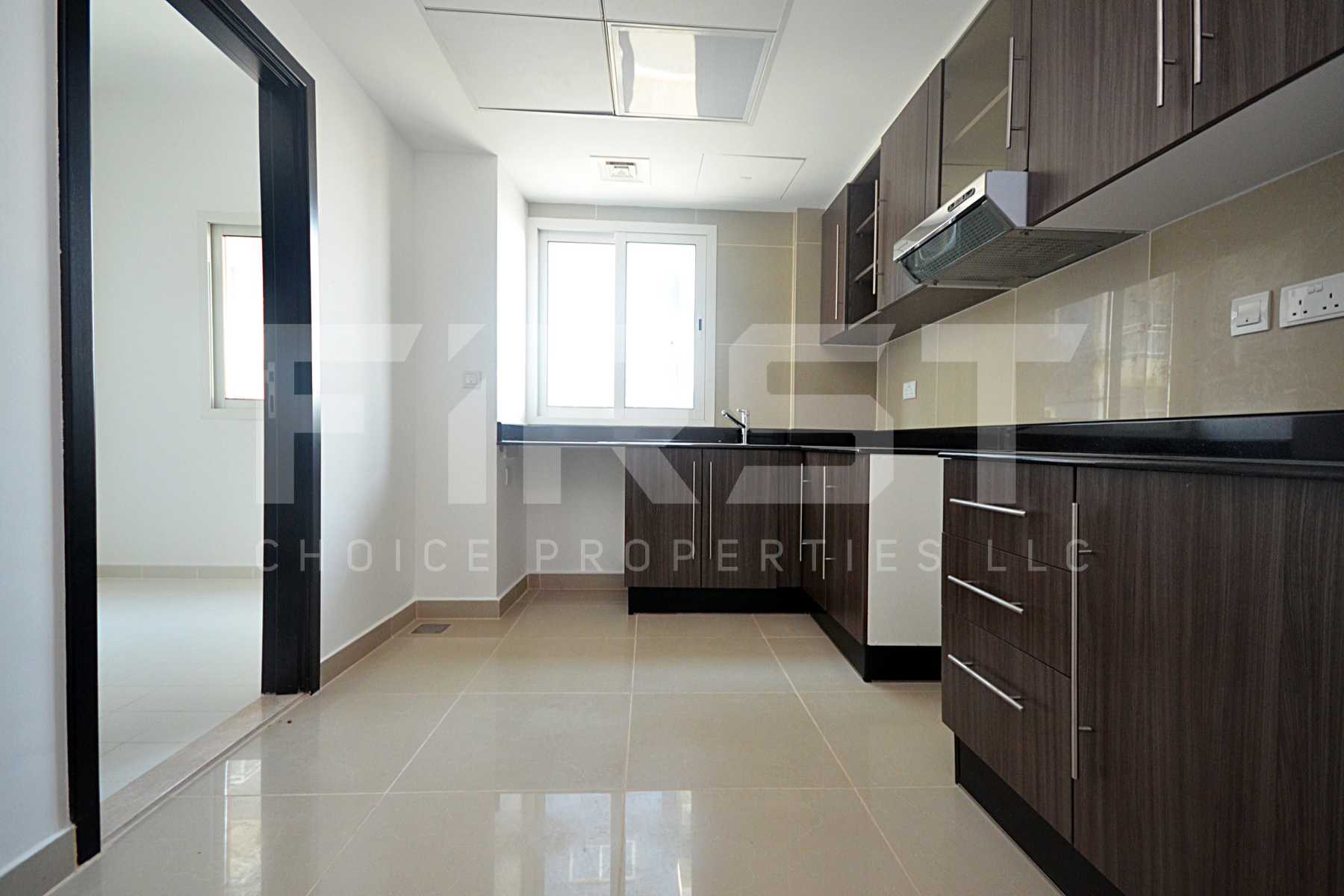 Internal Photo of 3 Bedroom Apartment Closed Kitchen in Al Reef Downtown Al Reef Abu Dhabi UAE (6).jpg